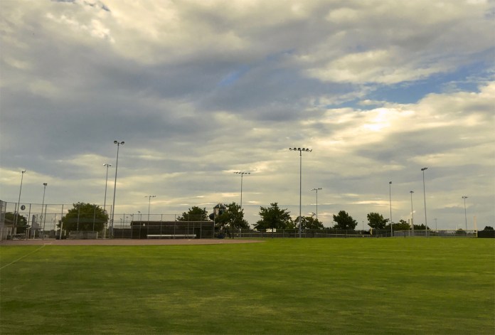 baseball field with clouds